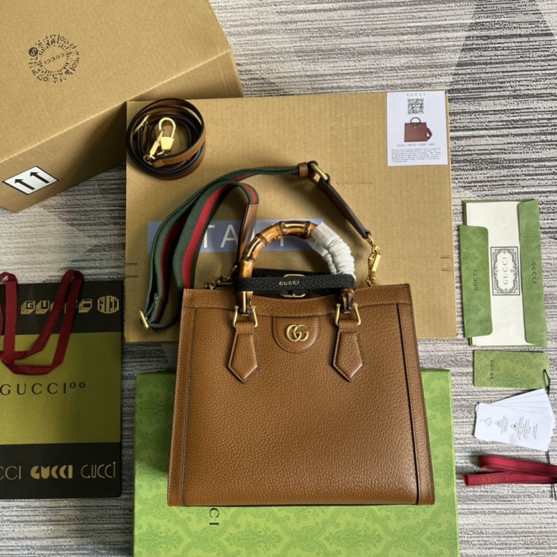 G*u*i top handle bags